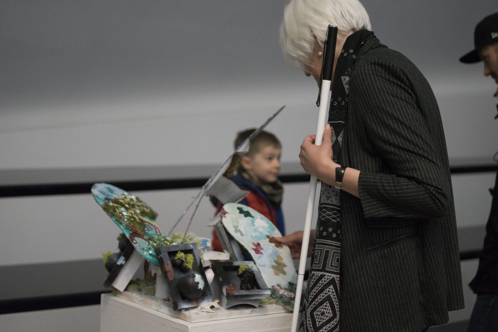 Woman artist creating tactile art